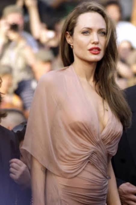 collins wekesa recommends Angelina Jolie Side Boob