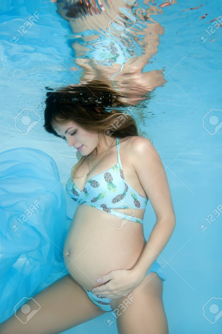 Pregnant Teen In Bikini at pool