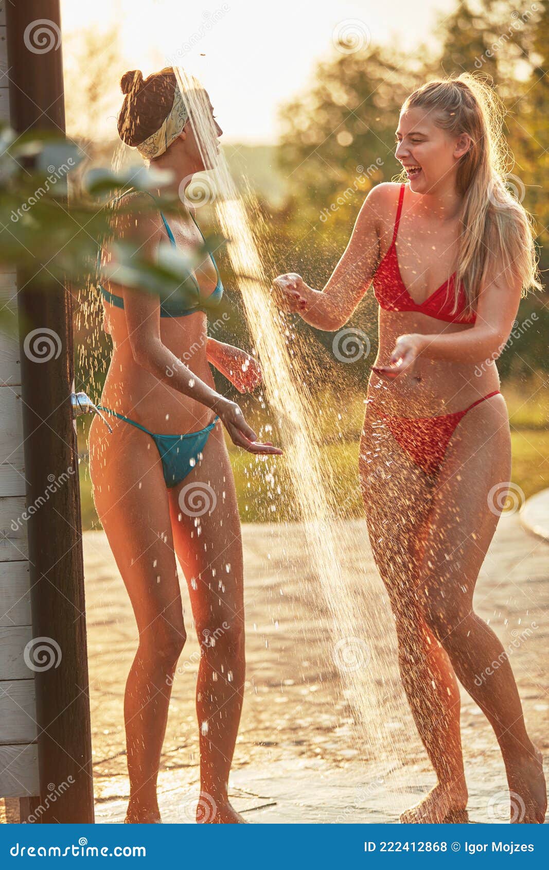 two girls showering together