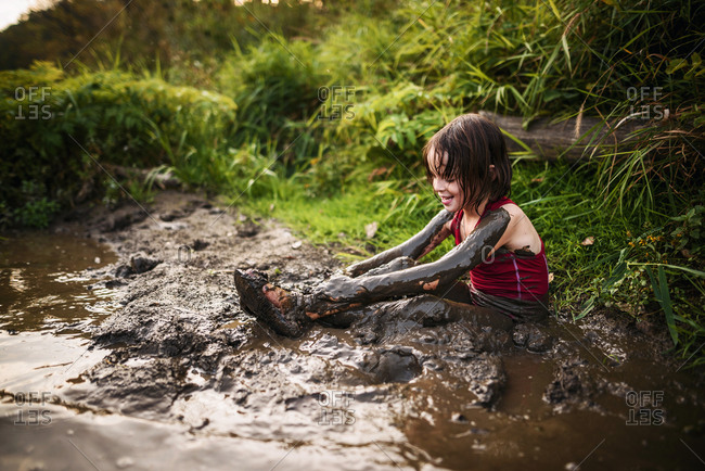 Girls Playing In Mud male doll