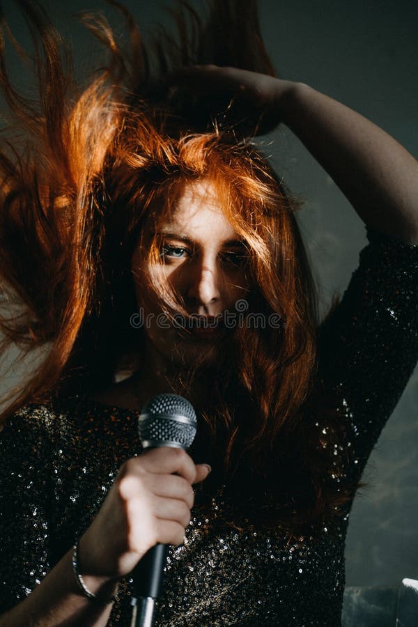 daniel liszewski add redhead female singer photo