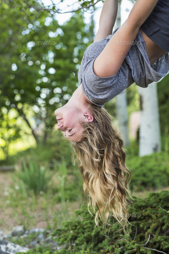 courtney creasy recommends woman hanging upside down pic