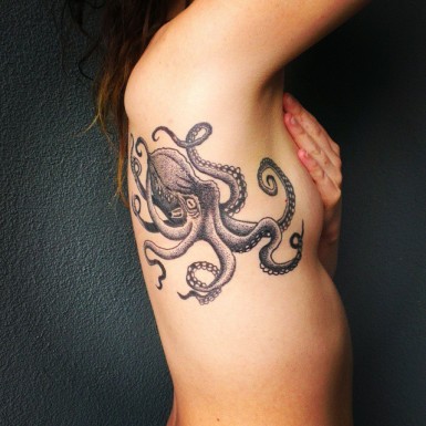 brian ybanez recommends woman with octopus tattoo pic