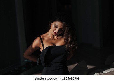 woman taking off dress