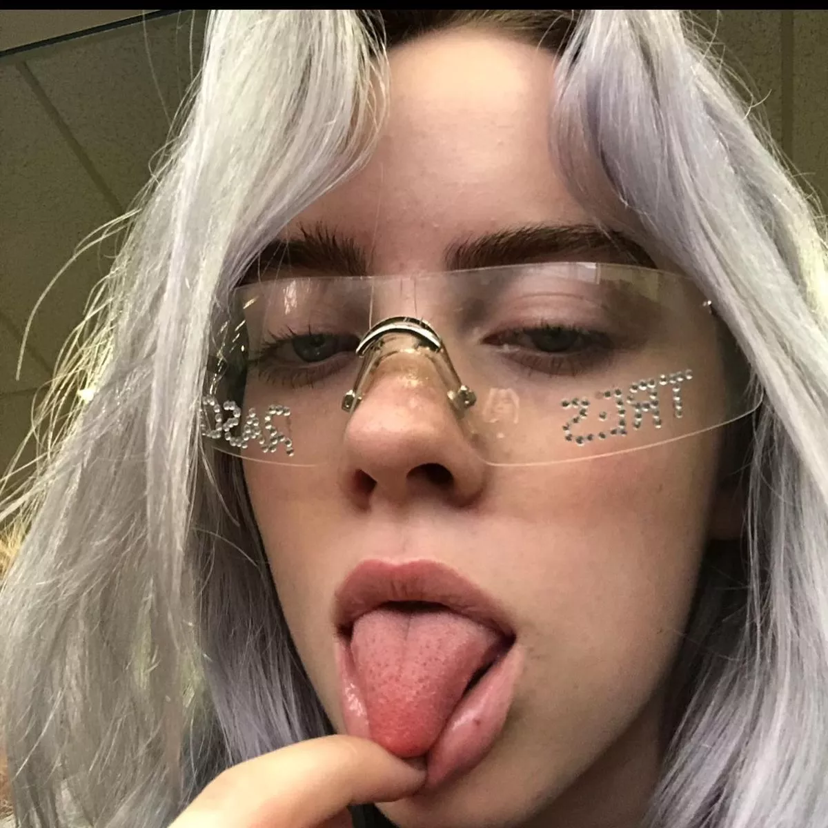 chris childerhose recommends billie eilish sticking her tongue out pic