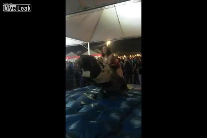 fat woman on mechanical bull