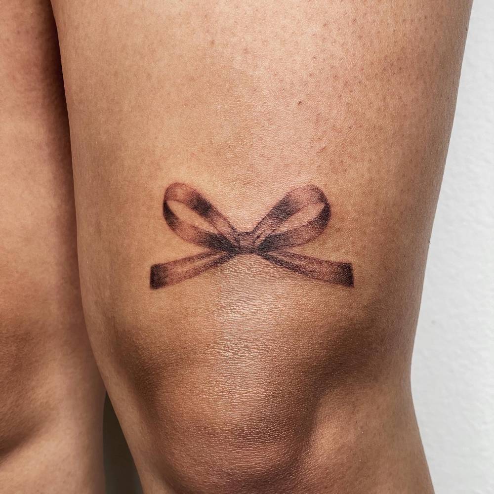 charles dcosta recommends bow tattoo on thigh pic