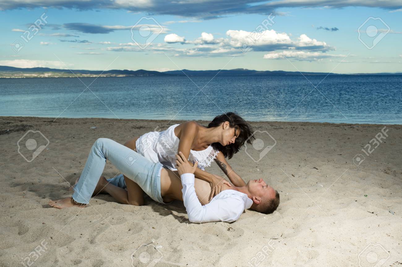 couple making love on the beach
