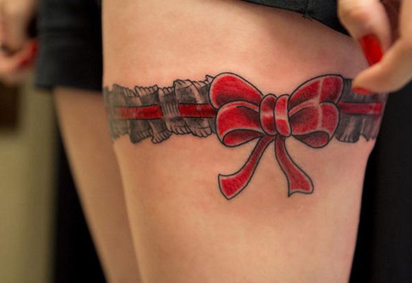 Best of Bow tattoo on thigh