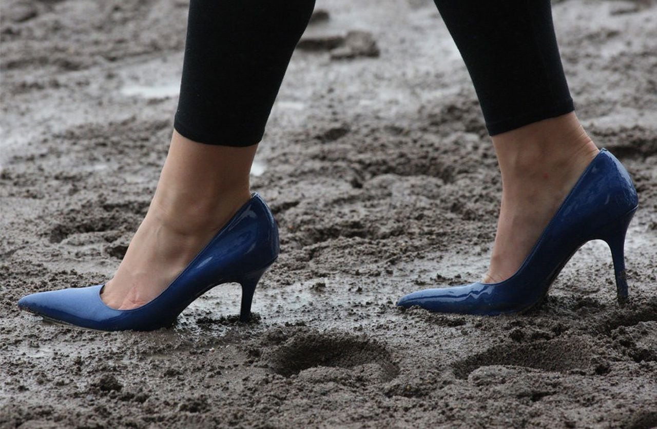high heels in mud
