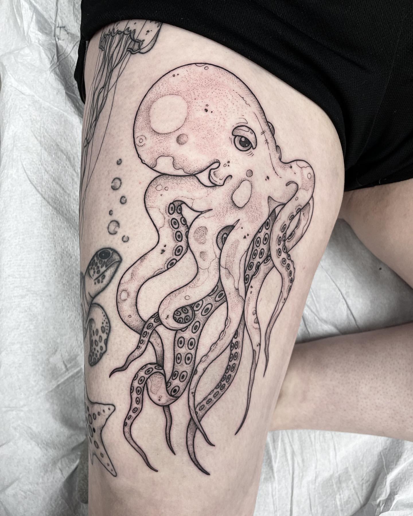 alexandru sinca recommends woman with octopus tattoo pic