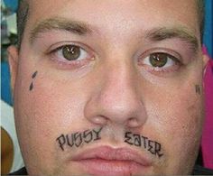 pussy eater tattoo