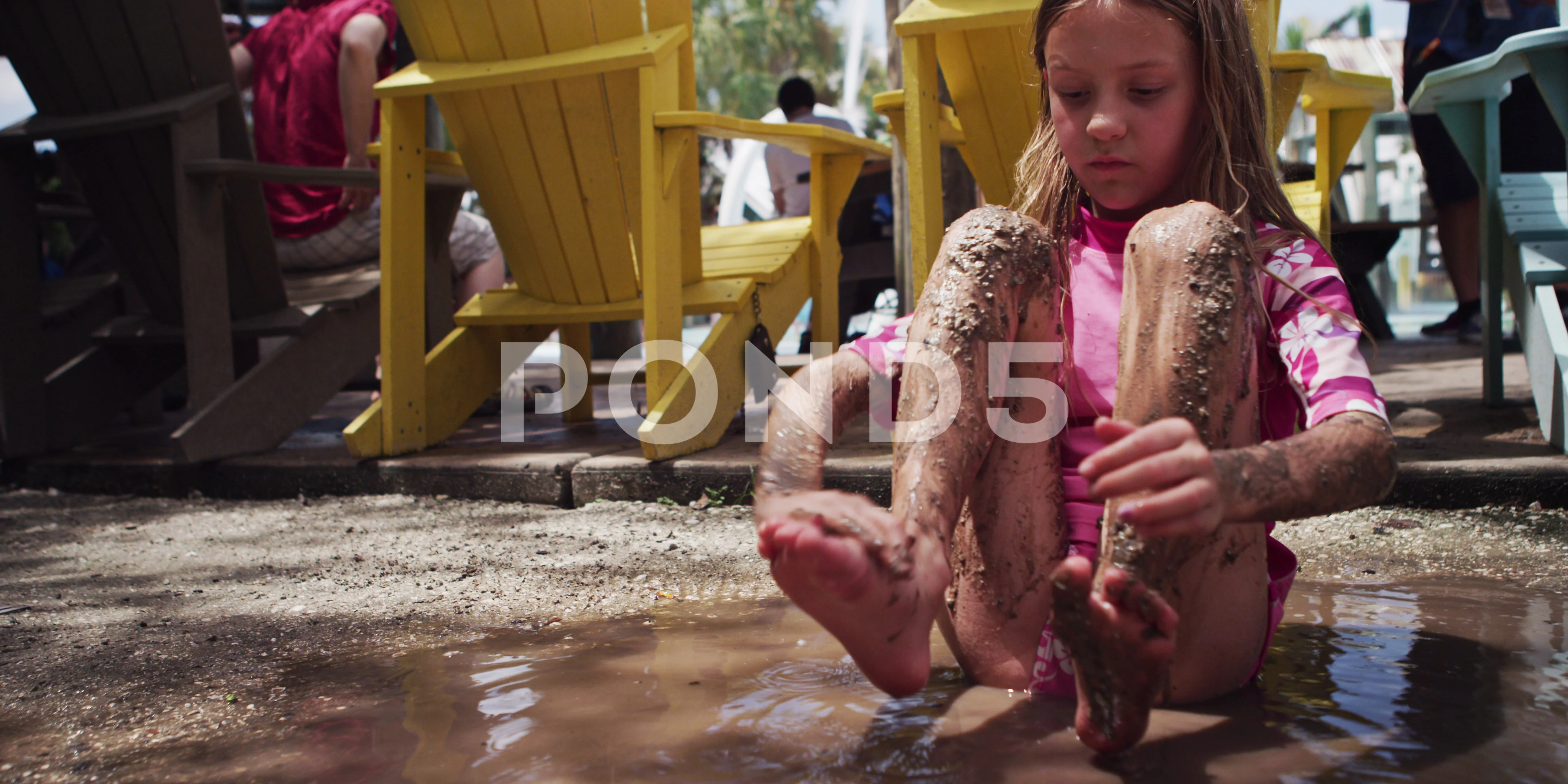 girls playing in mud