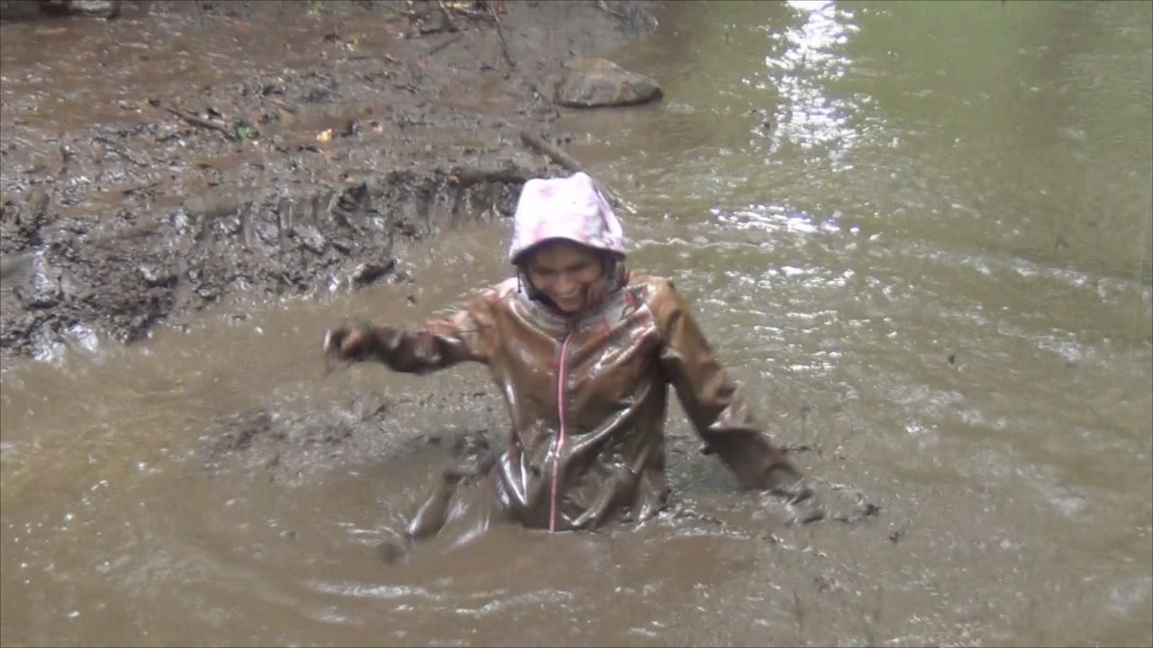 beauford john add photo girls playing in mud