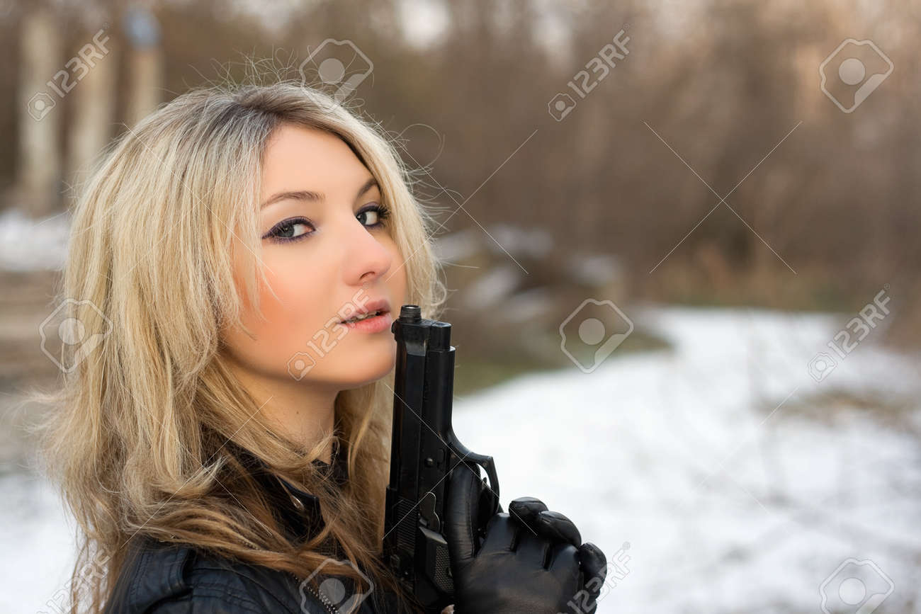 adam oleary add hot chick with a gun photo